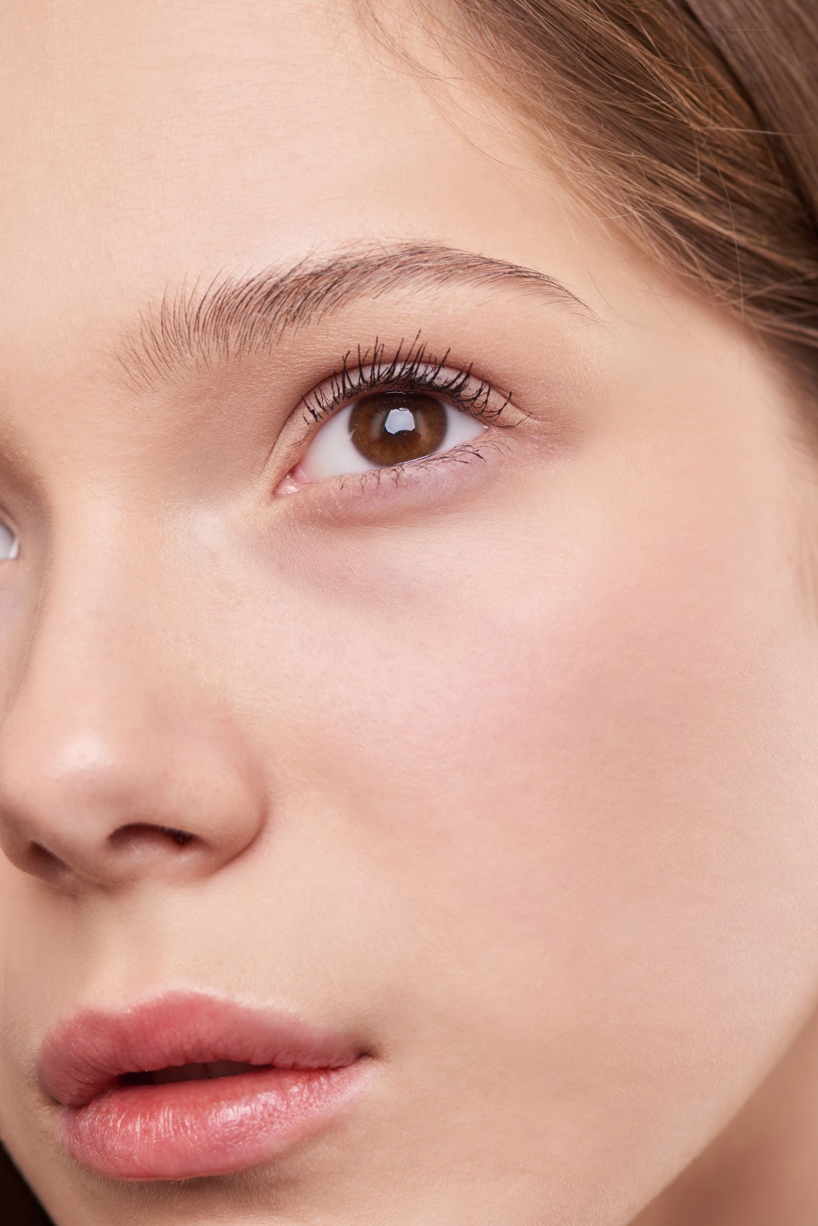 Sydney Ann model with bare, dewy skin and brown eyes, Austin